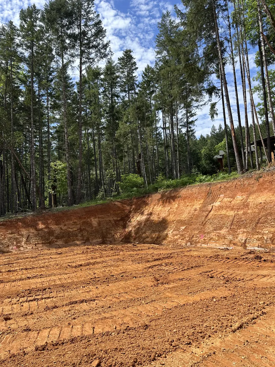 Prepared building pad on a wooded Southern Oregon property